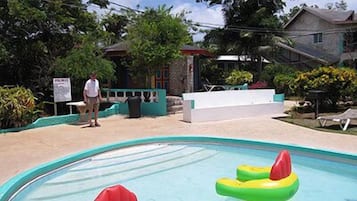 Outdoor pool, pool umbrellas, pool loungers