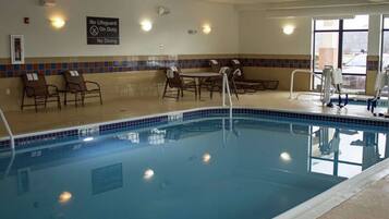 Indoor pool, open 7 AM to 11 PM, pool loungers