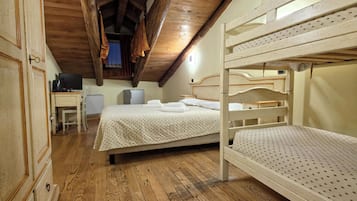 Classic Quadruple Room | Down comforters, minibar, desk, blackout drapes