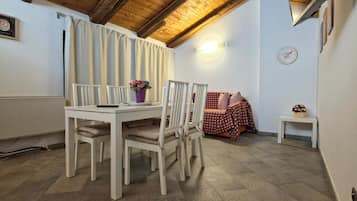 Exclusive Apartment | Living area | Flat-screen TV