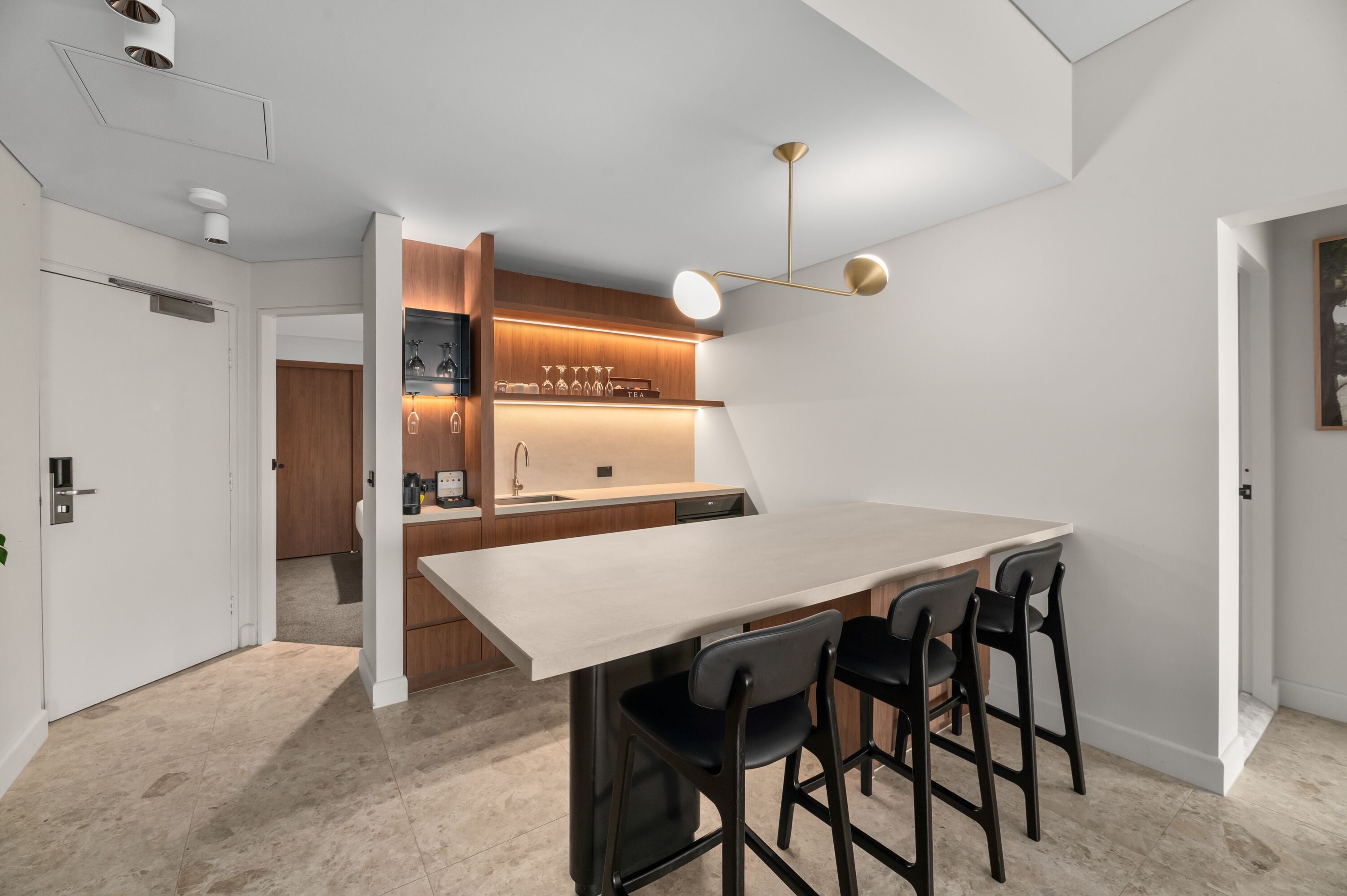 the director's suite | private kitchen | fridge, espresso maker, electric kettle, dining tables