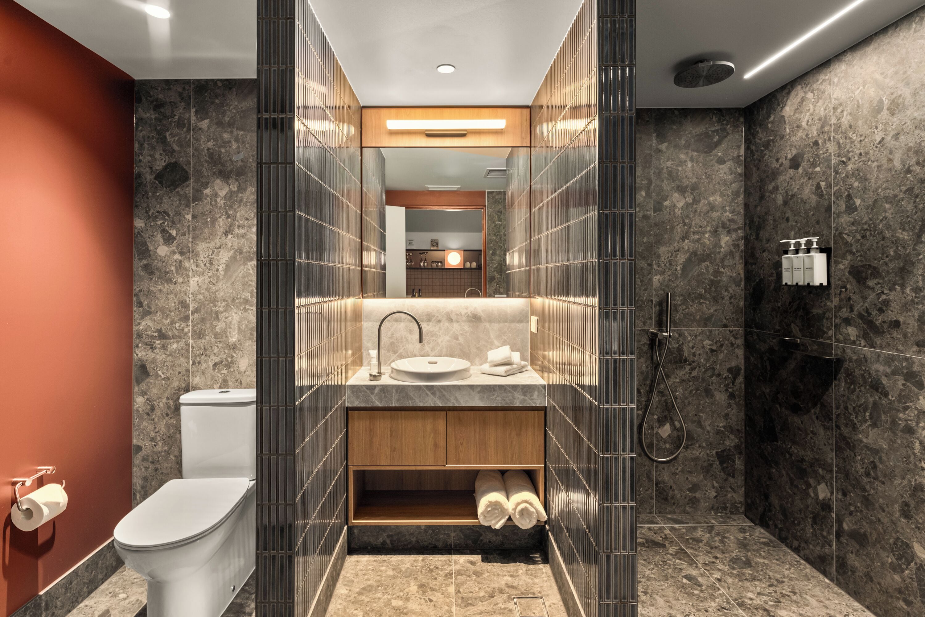 signature suite | bathroom | free toiletries, hair dryer, bathrobes, slippers