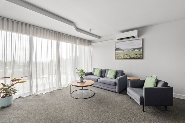Suite, 2 soverom, terrasse, hageutsikt | Utsikt fra rommet