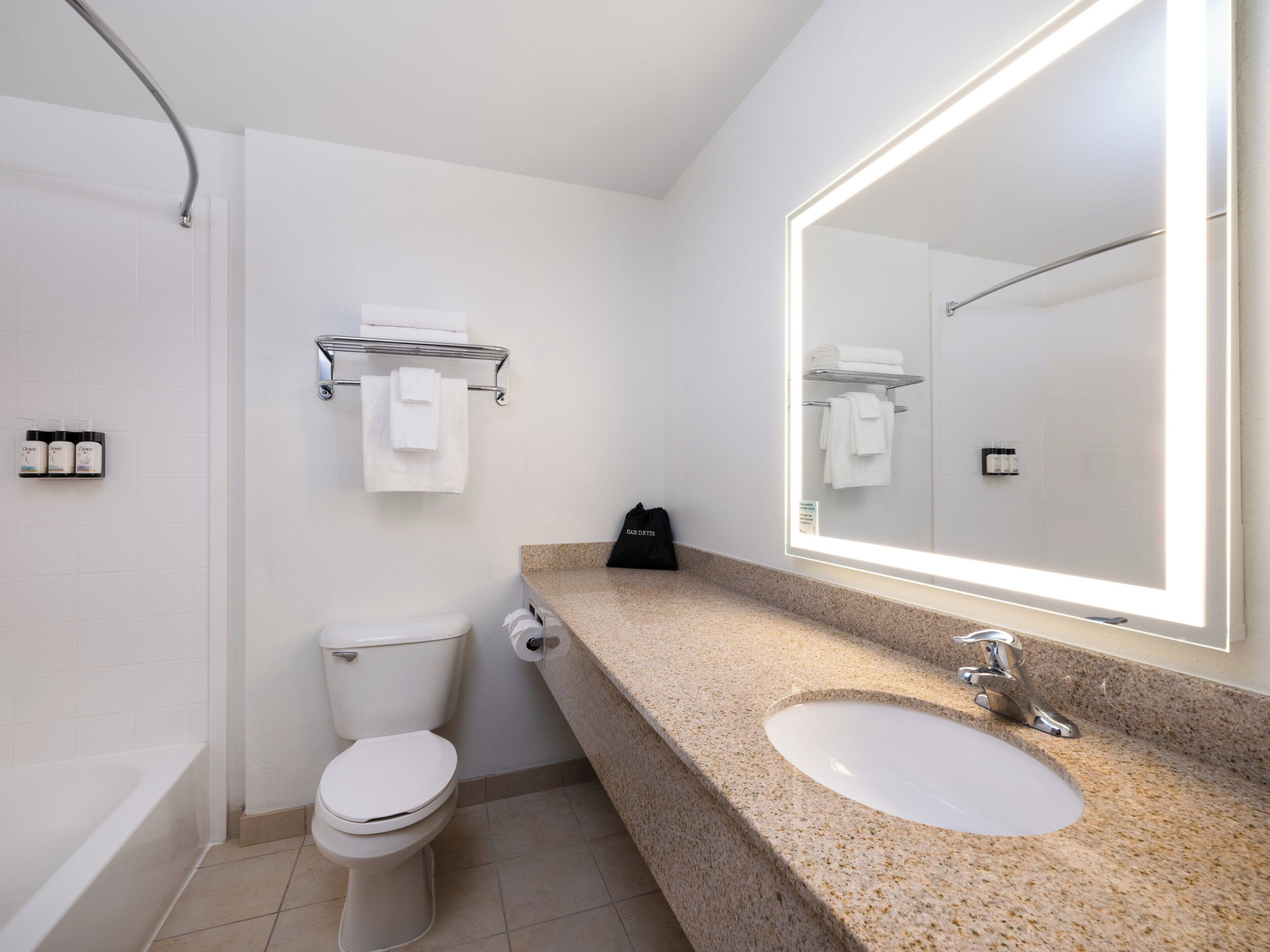 combined shower/bathtub, free toiletries, hair dryer, towels