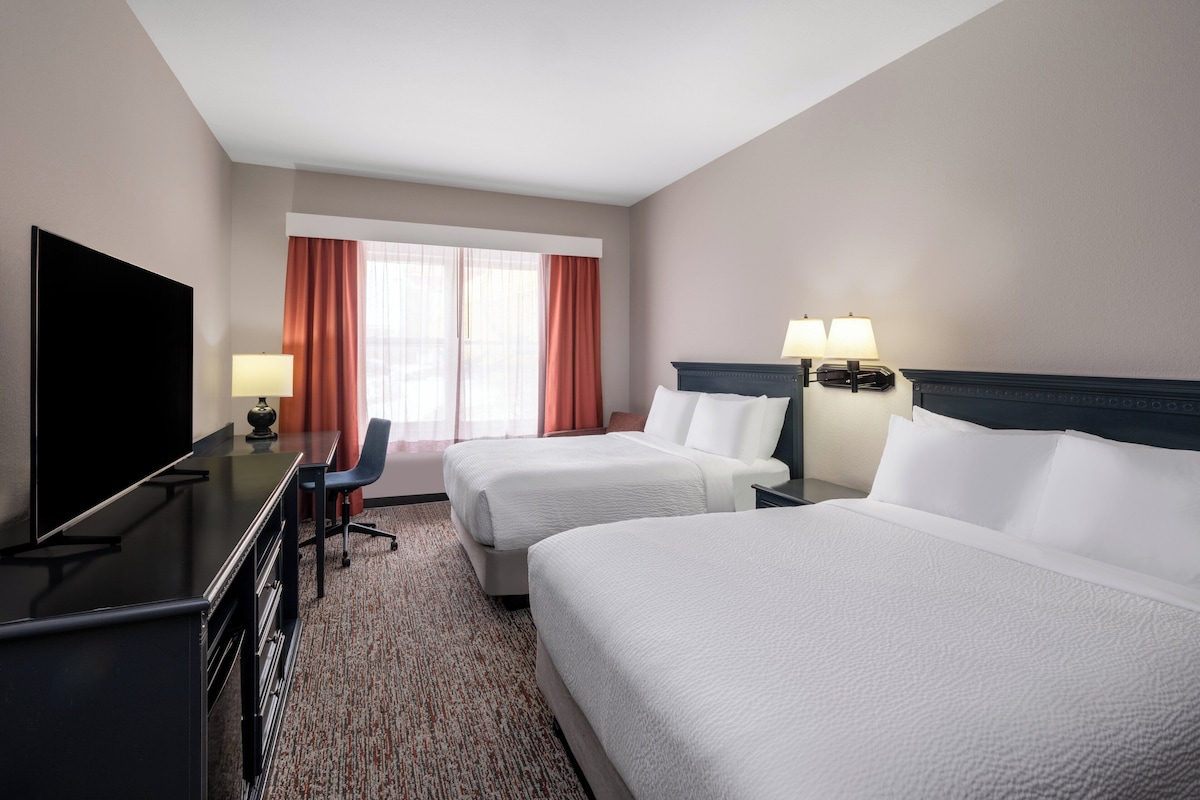 Premium bedding, pillowtop beds, desk, blackout drapes