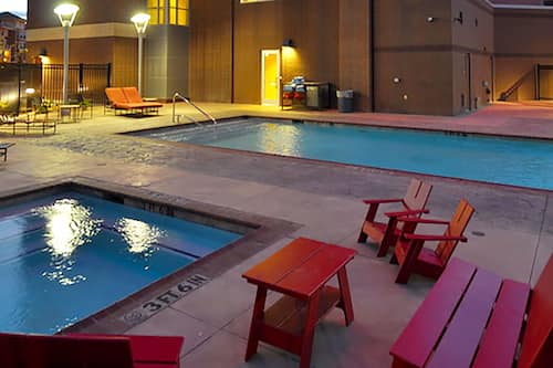 Outdoor pool, open 7:00 AM to 10:00 PM, sun loungers