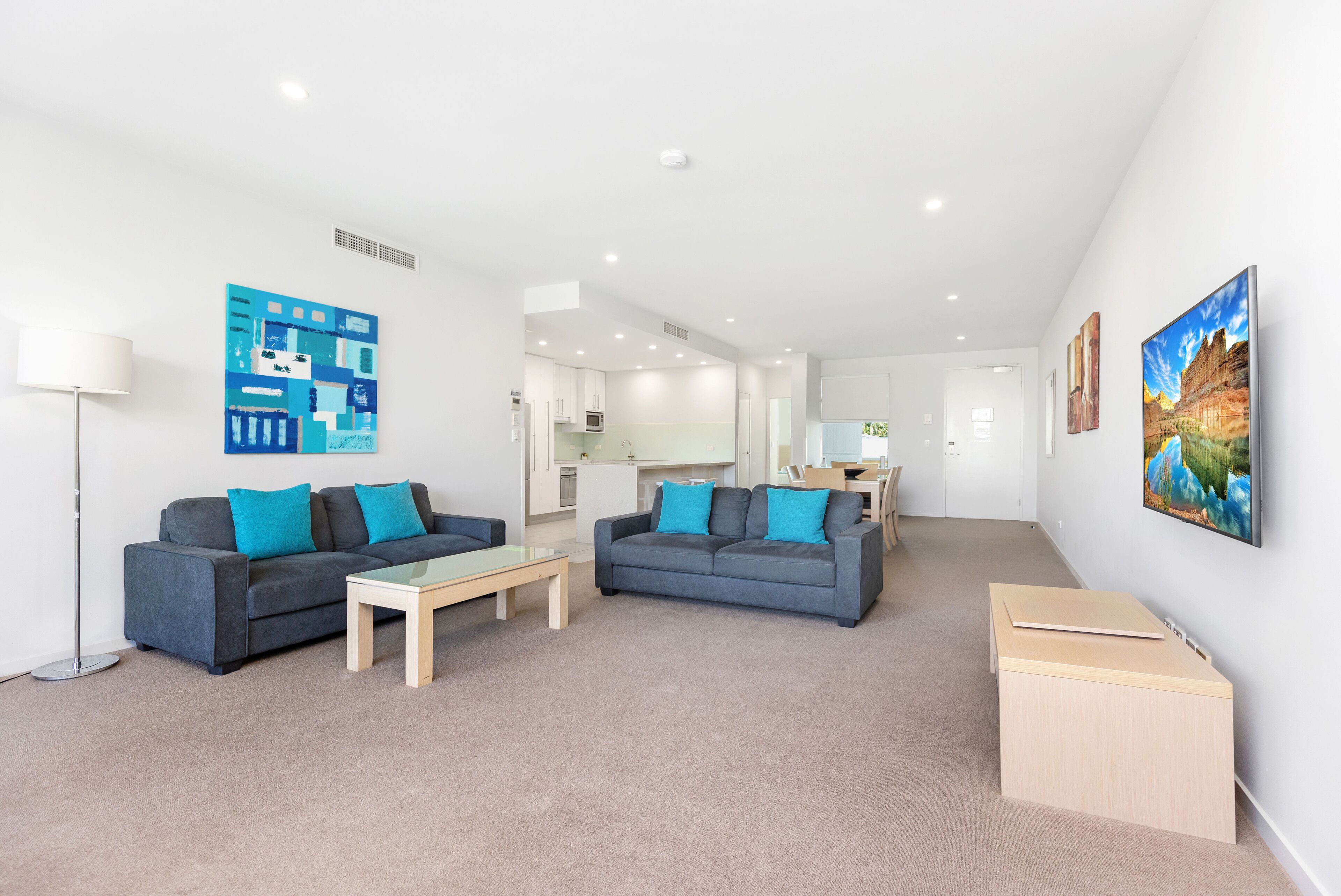 standard apartment, 3 bedrooms, pool view | living area | 105-cm lcd tv with cable channels, tv, dvd player