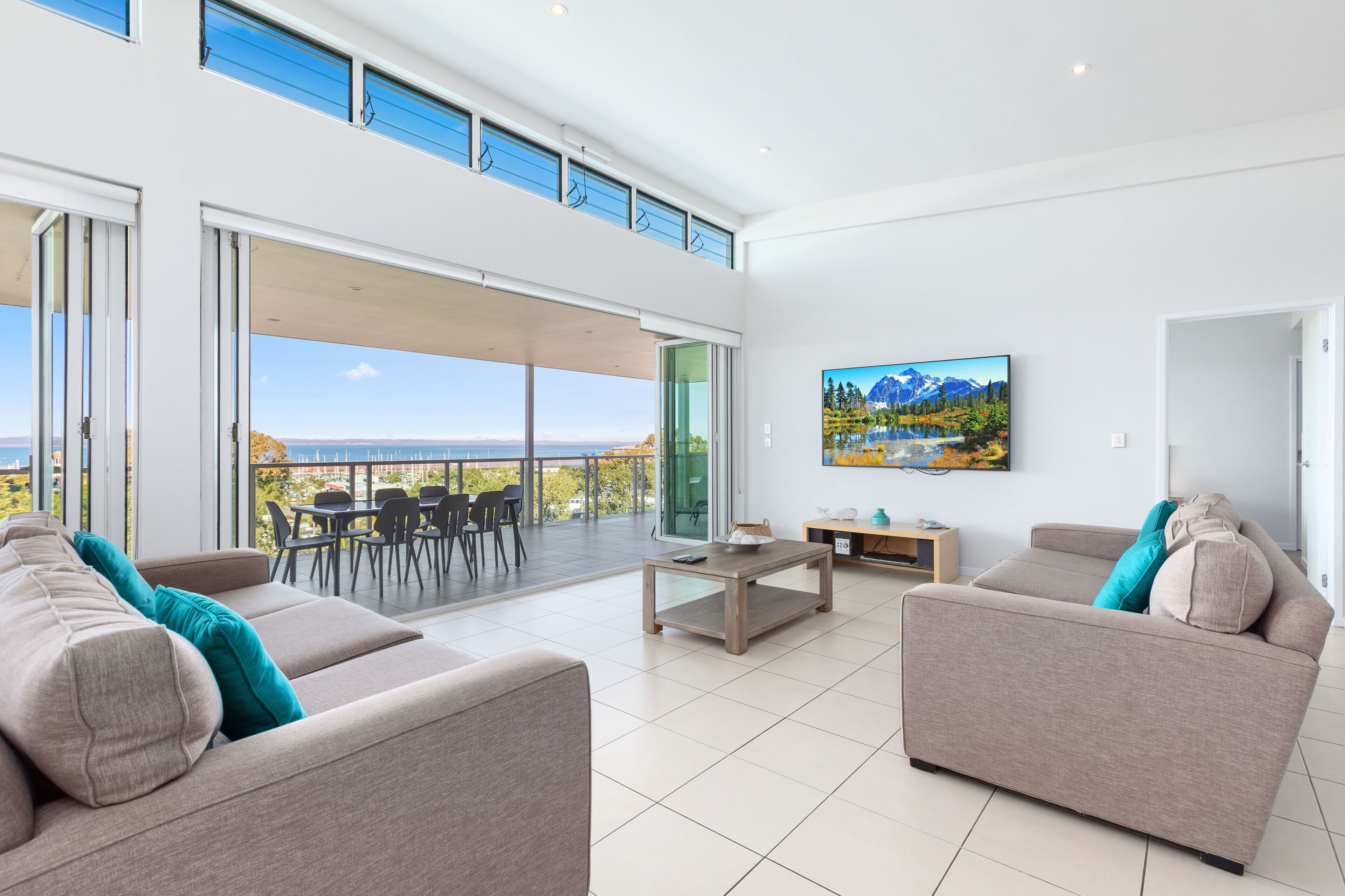 Superior Penthouse | Living area | 105-cm LCD TV with cable channels, TV, DVD player