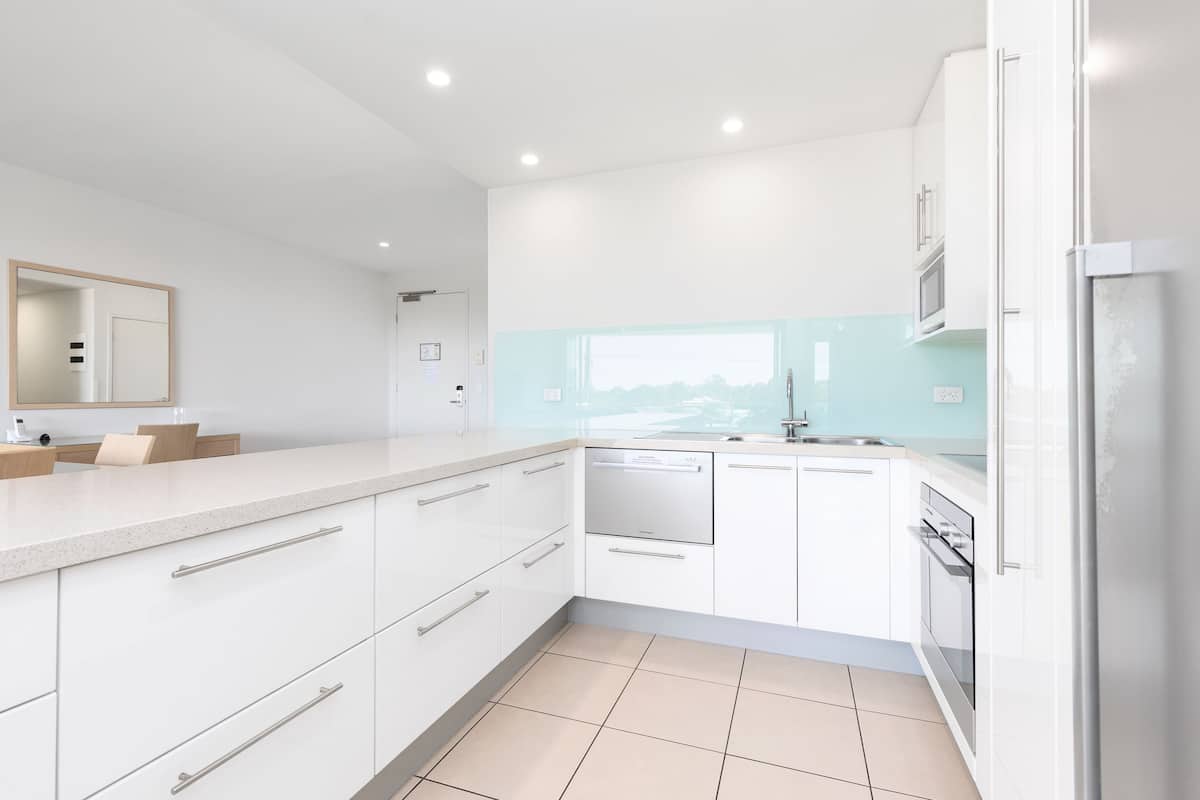 full-sized fridge, microwave, dishwasher, espresso maker