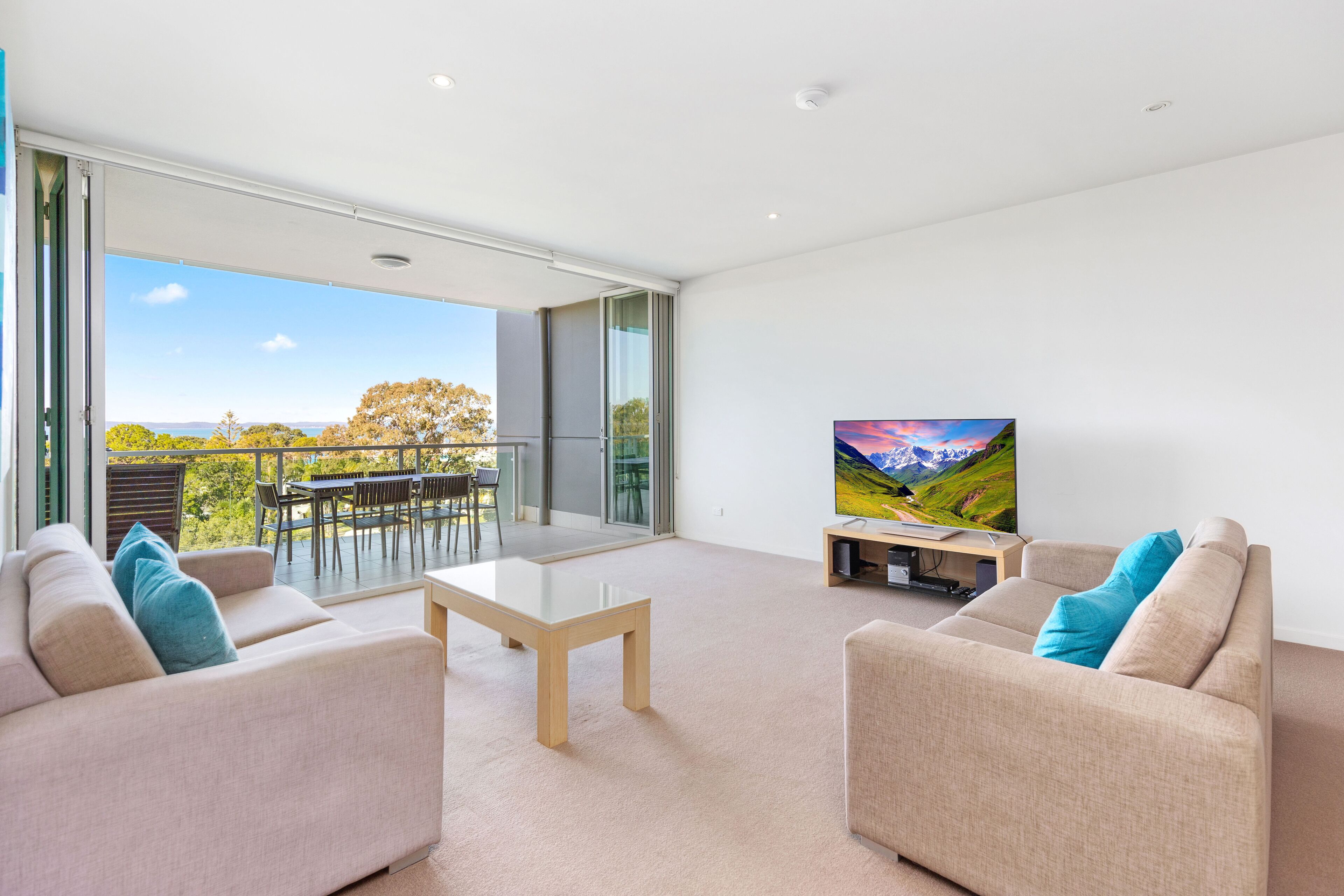 standard room, 2 bedrooms, partial ocean view | living area | 105-cm lcd tv with cable channels, tv, dvd player