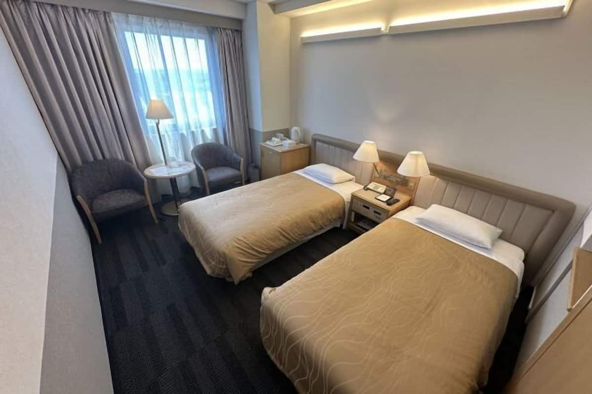 Een strijkplank/strijkijzer, gratis wifi, beddengoed
