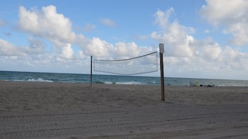 On the beach, white sand, beach towels