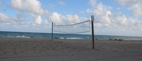 On the beach, white sand, beach towels