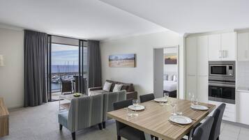 Superior Apartment, 2 Bedrooms, Harbor View | Minibar, in-room safe, desk, laptop workspace