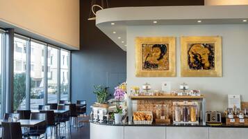 Daily buffet breakfast (CHF 19 per person)