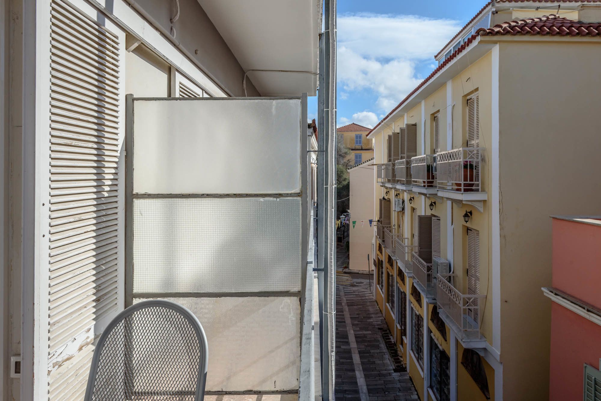 standard triple room, city view | balcony