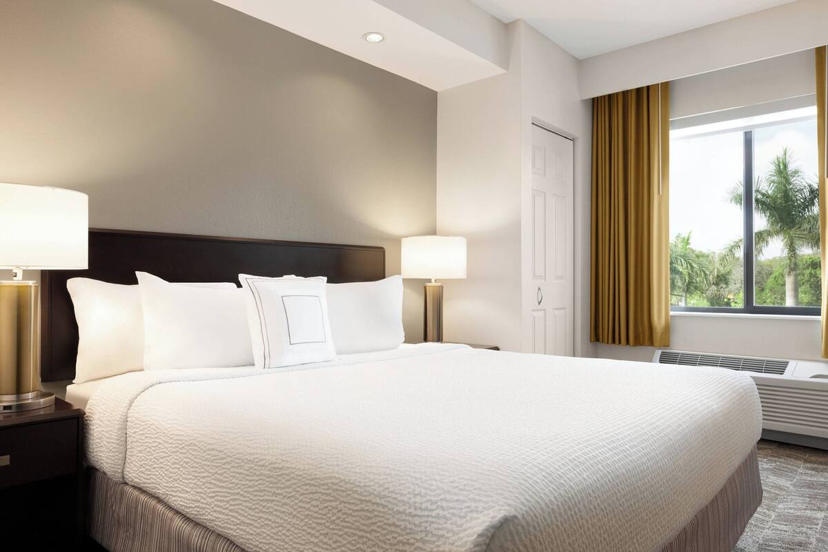 premium bedding, desk, blackout curtains, iron/ironing board