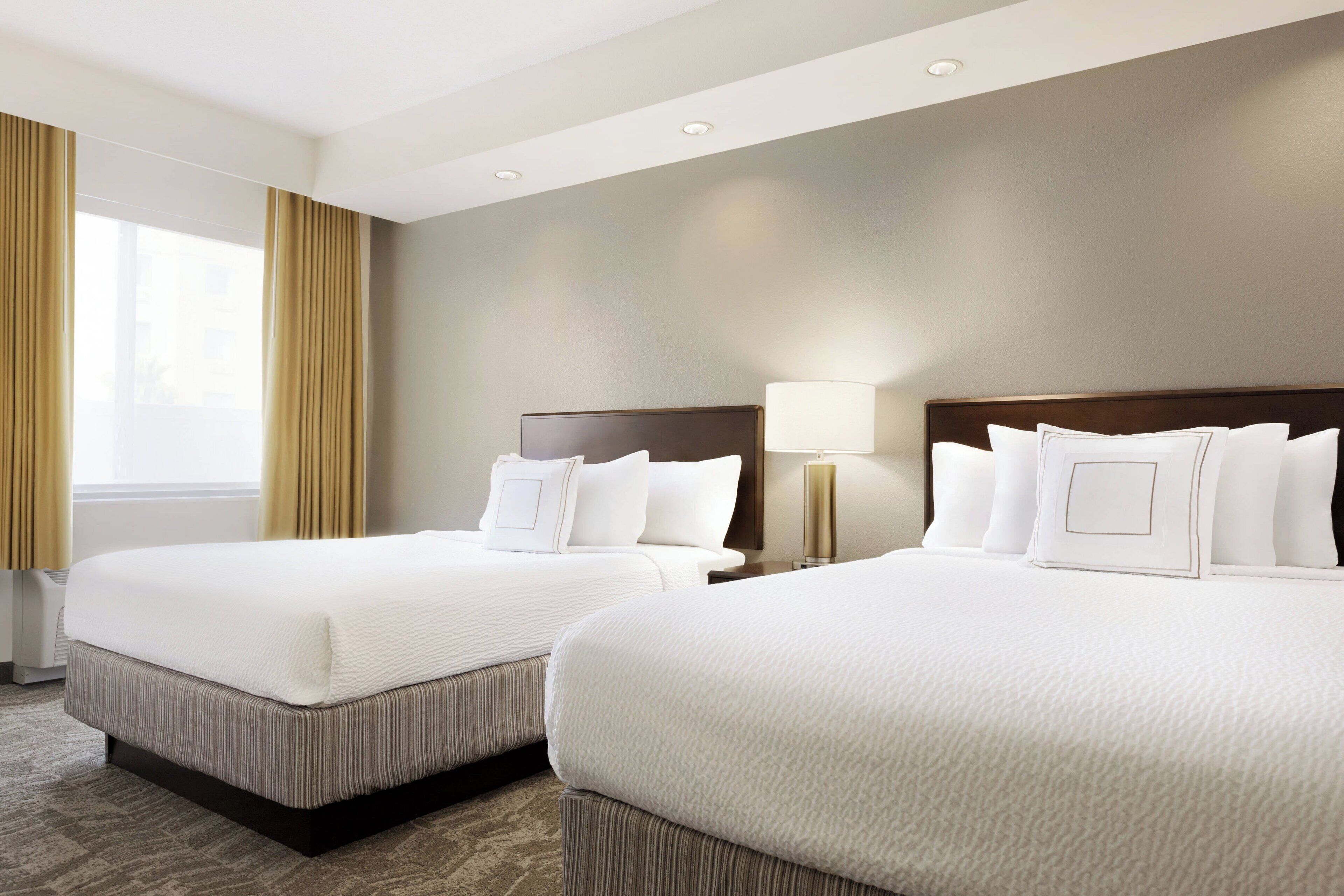 premium bedding, desk, blackout curtains, iron/ironing board