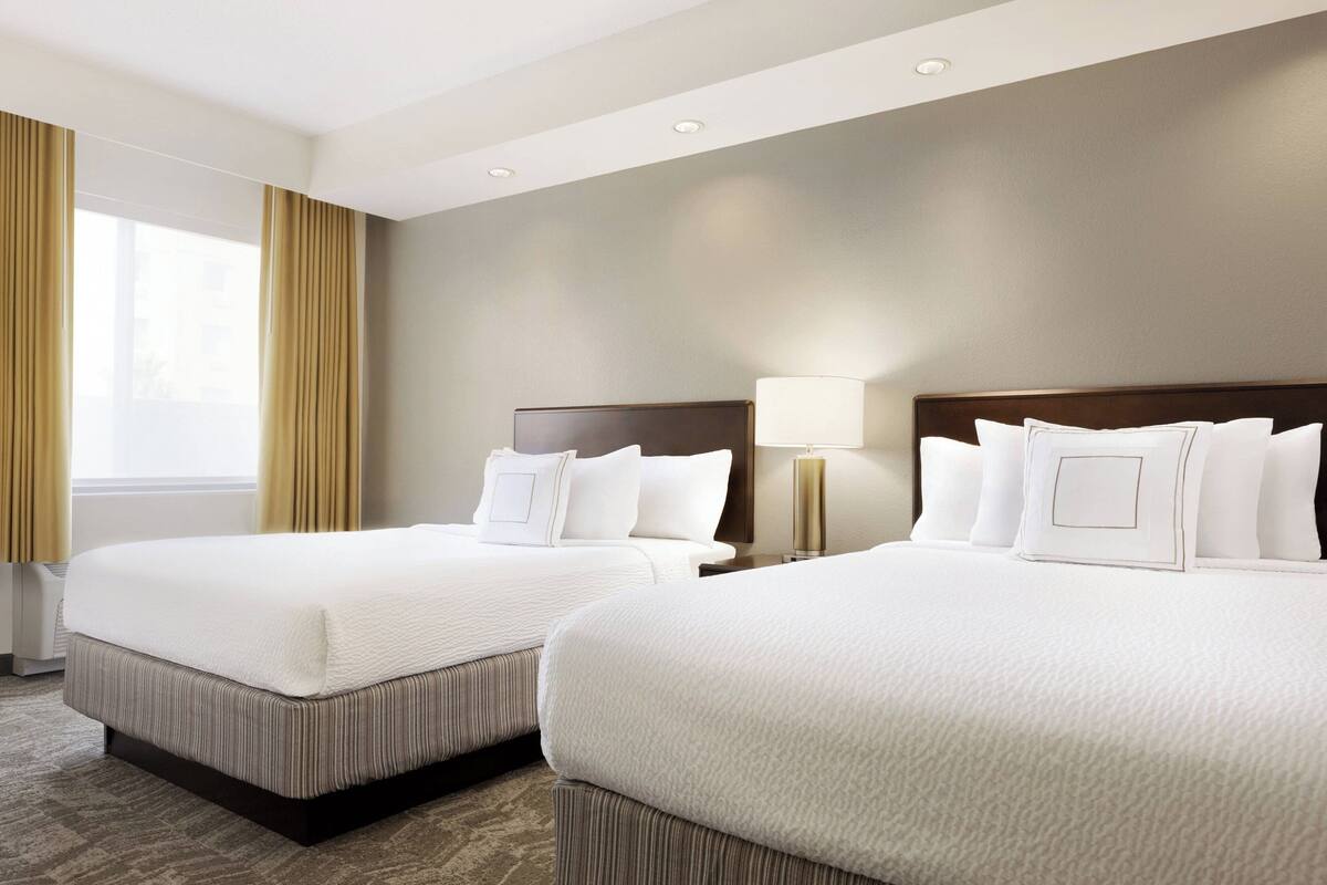 premium bedding, desk, blackout curtains, iron/ironing board