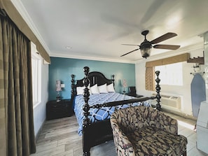 Deluxe Suite, Kitchen | Individually decorated, individually furnished, desk, blackout drapes