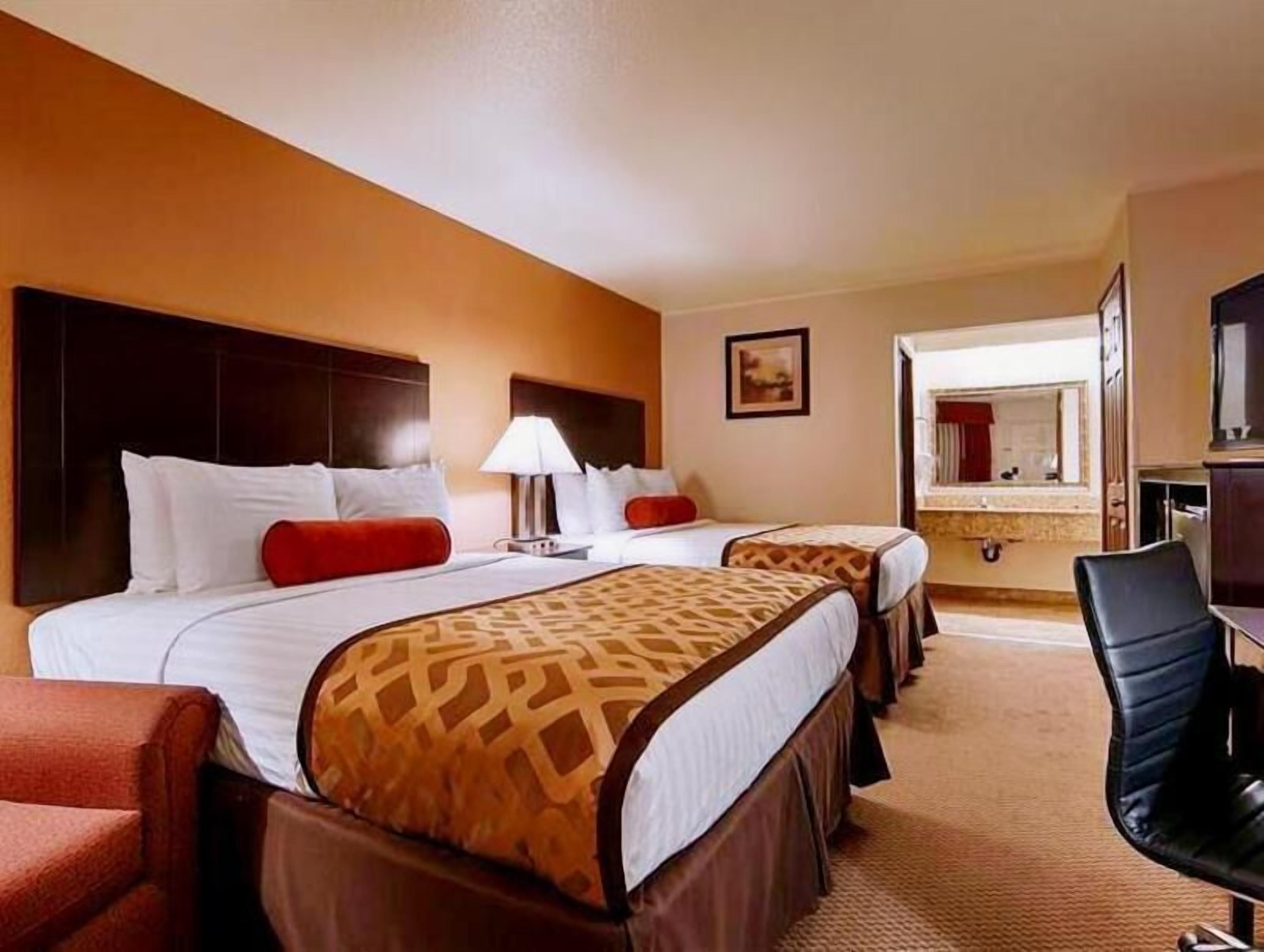 Premium bedding, down duvets, pillow-top beds, in-room safe