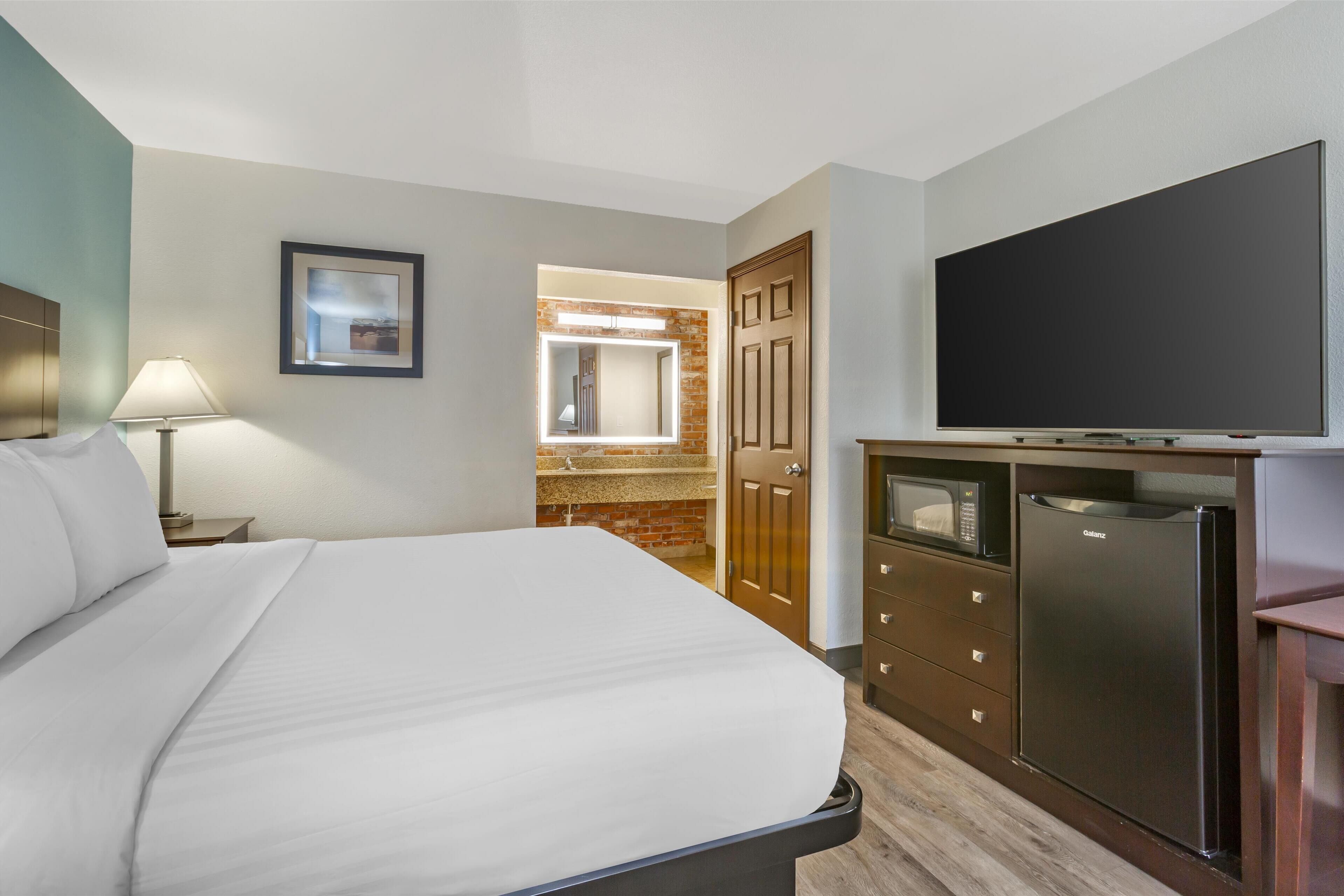 premium bedding, down duvets, pillow-top beds, in-room safe