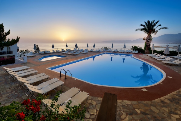 2 outdoor pools, pool umbrellas, sun loungers