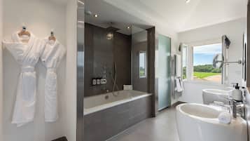 Deluxe Room | Bathroom | Free toiletries, bathrobes, slippers, towels