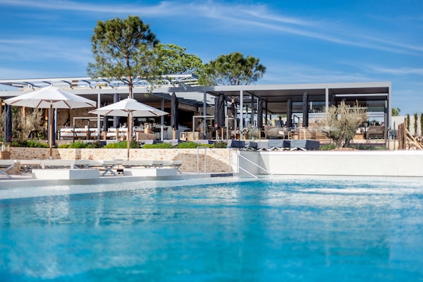Indoor pool, 2 outdoor pools, pool umbrellas, pool loungers