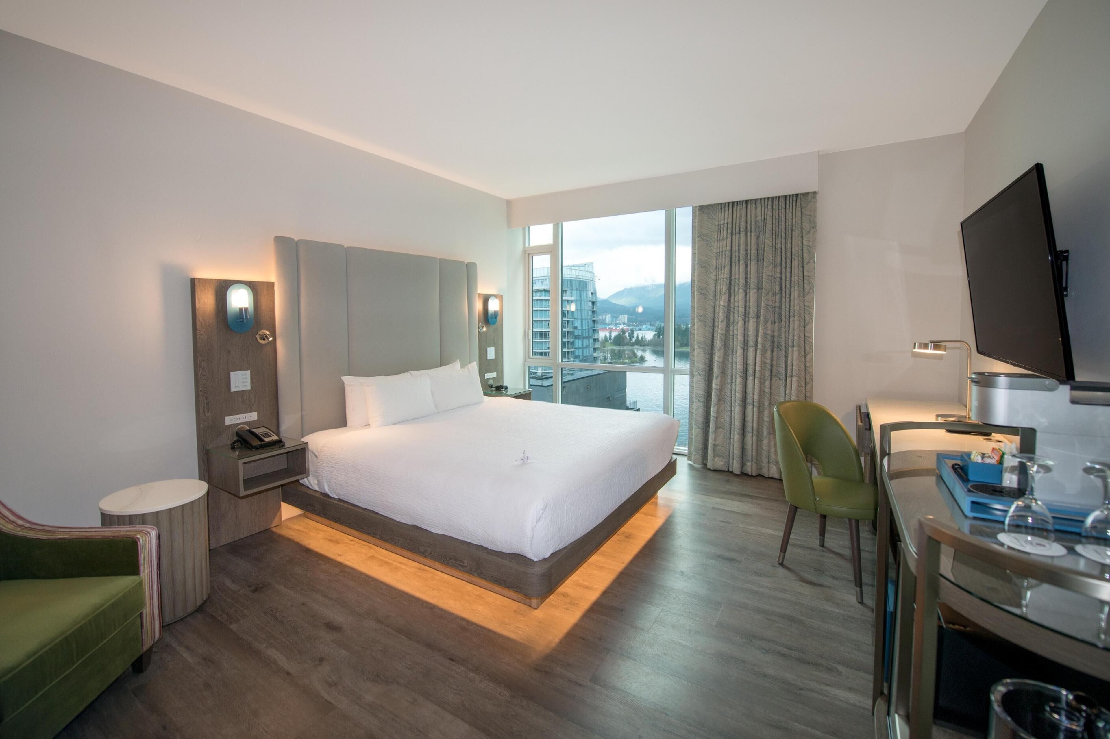 Premium King Room | Premium bedding, in-room safe, desk, blackout drapes