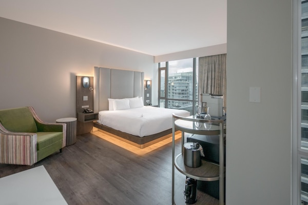Premium King Room | Premium bedding, in-room safe, desk, blackout drapes