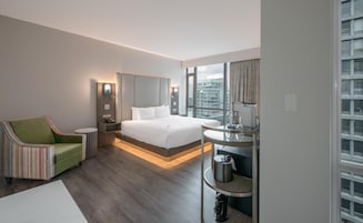 Premium King Room | Premium bedding, in-room safe, desk, blackout drapes