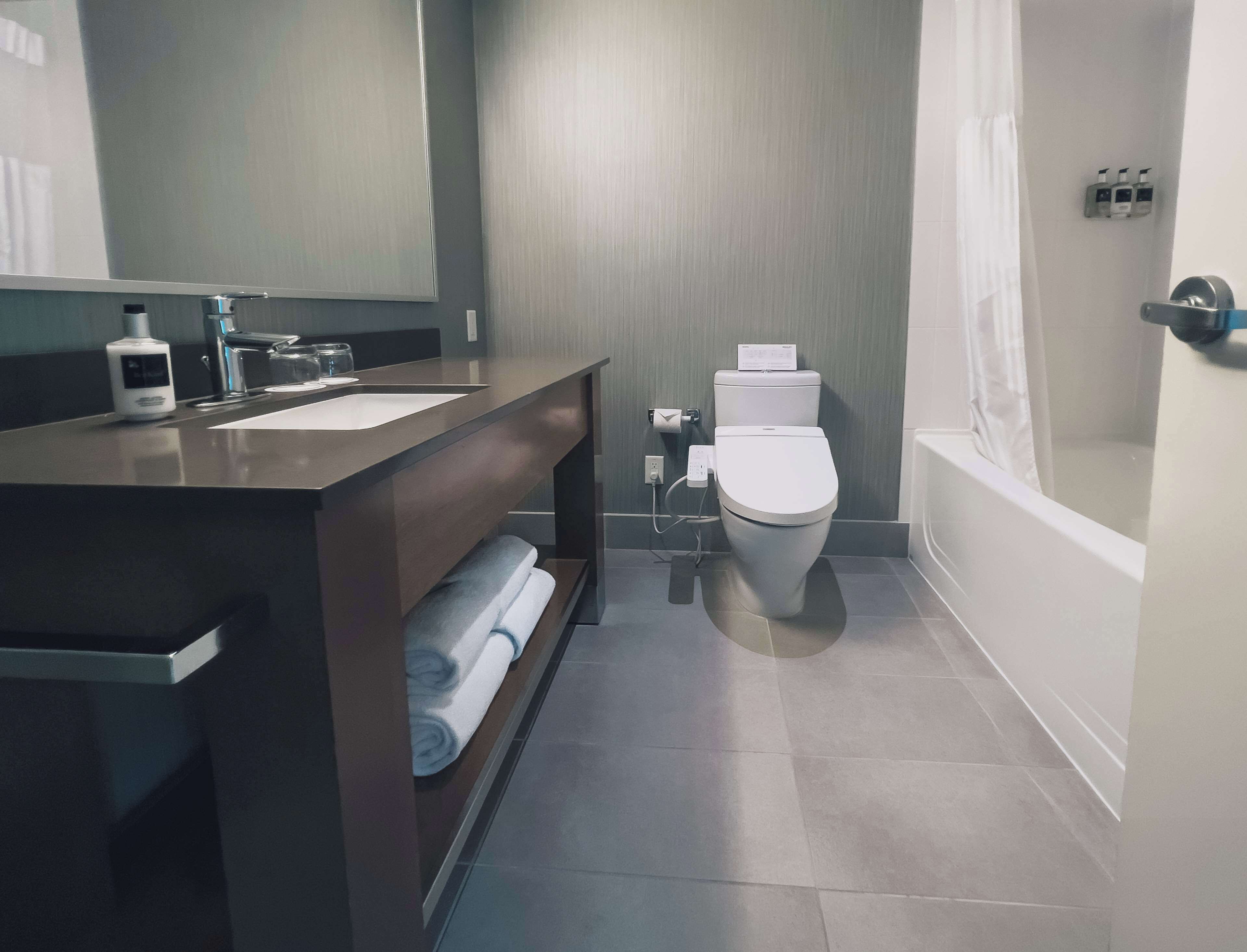 combined shower/bathtub, free toiletries, hair dryer, bathrobes