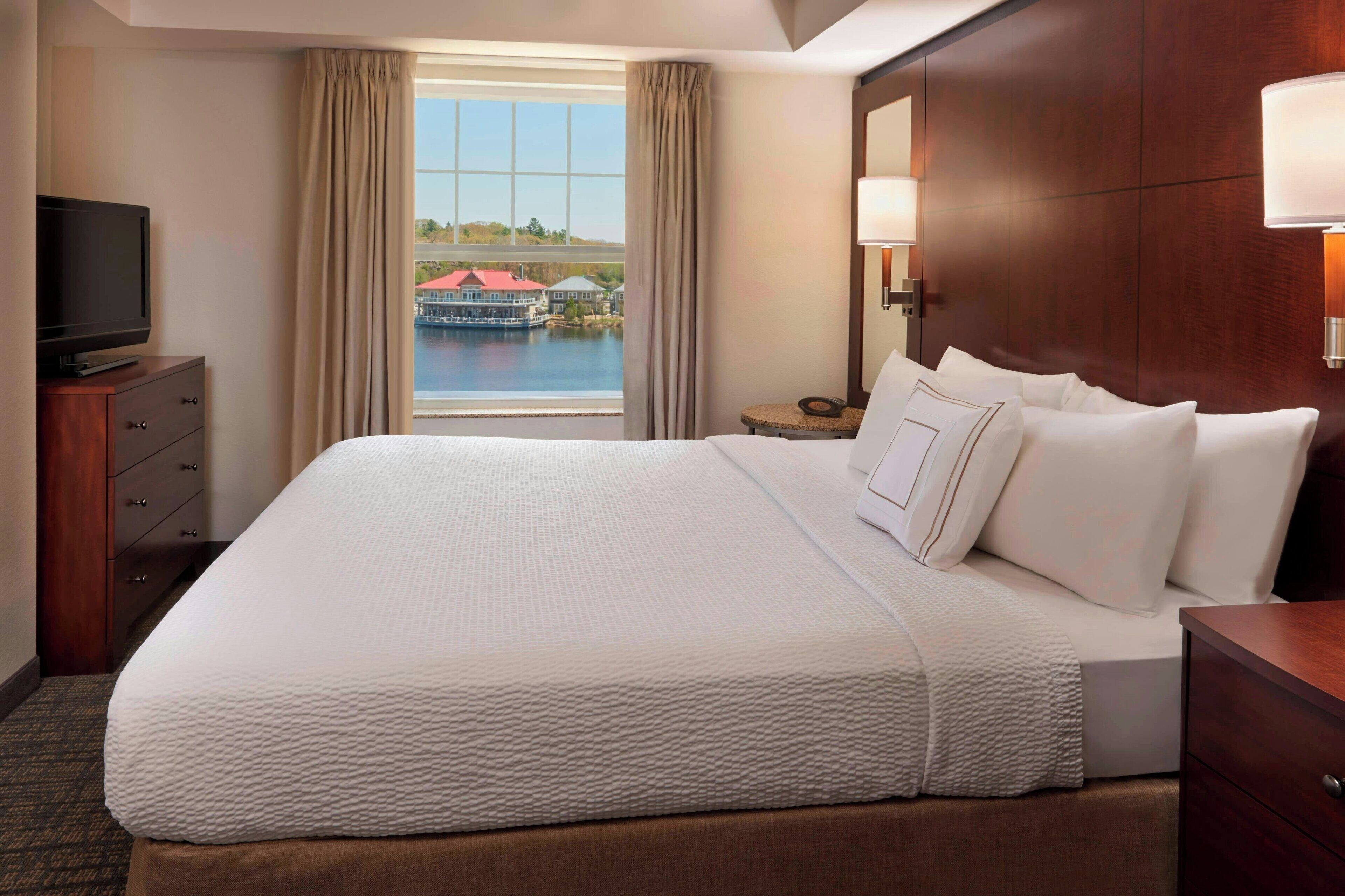 Premium bedding, blackout drapes, iron/ironing board