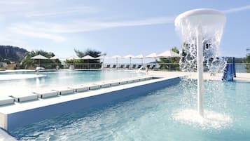 Indoor pool, 3 outdoor pools, open 9:00 AM to 6:00 PM, pool umbrellas