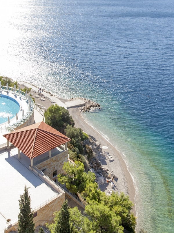On the beach, sun loungers, beach umbrellas, beach towels