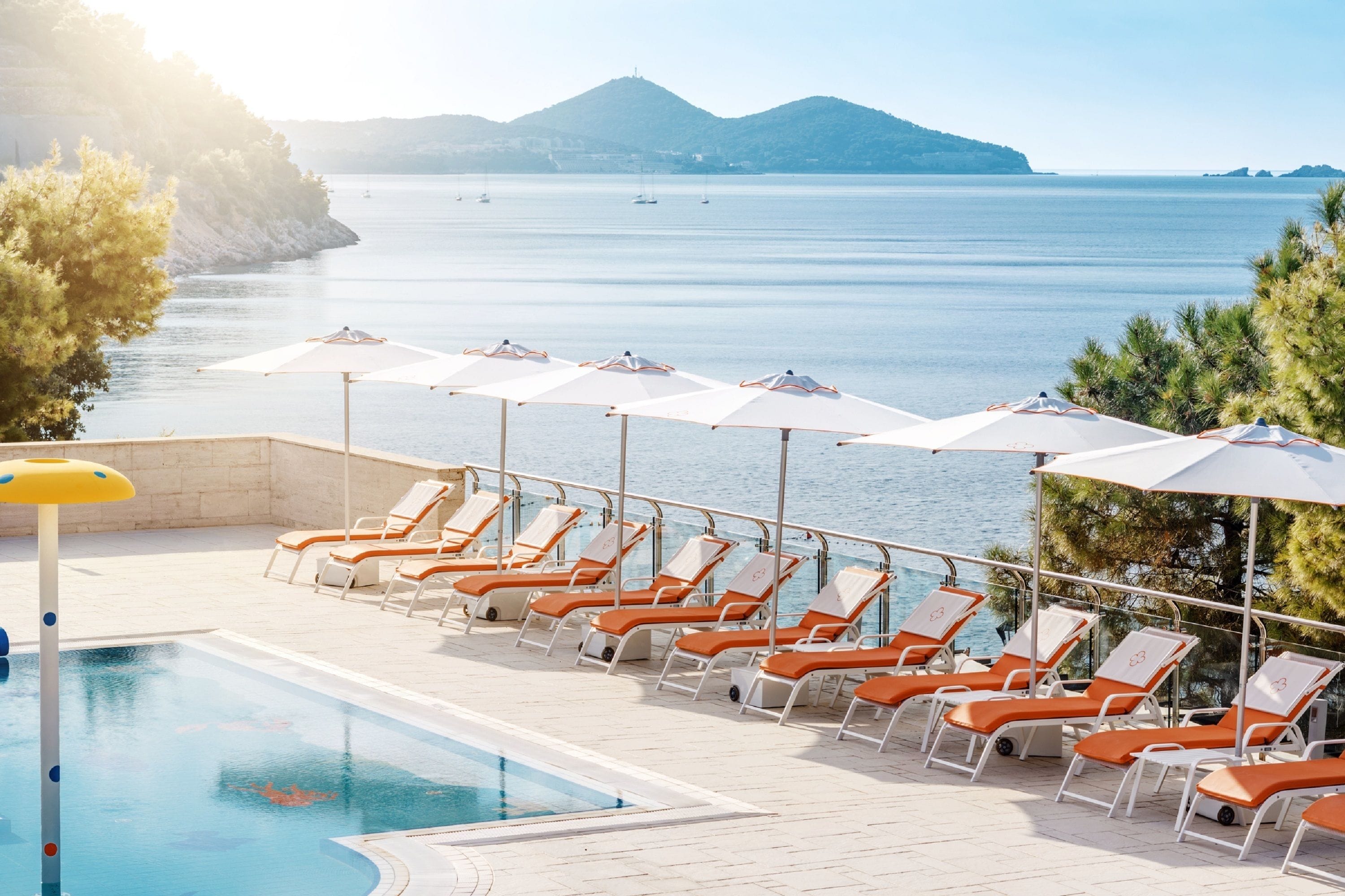 indoor pool, 3 outdoor pools, open 9:00 am to 6:00 pm, pool umbrellas