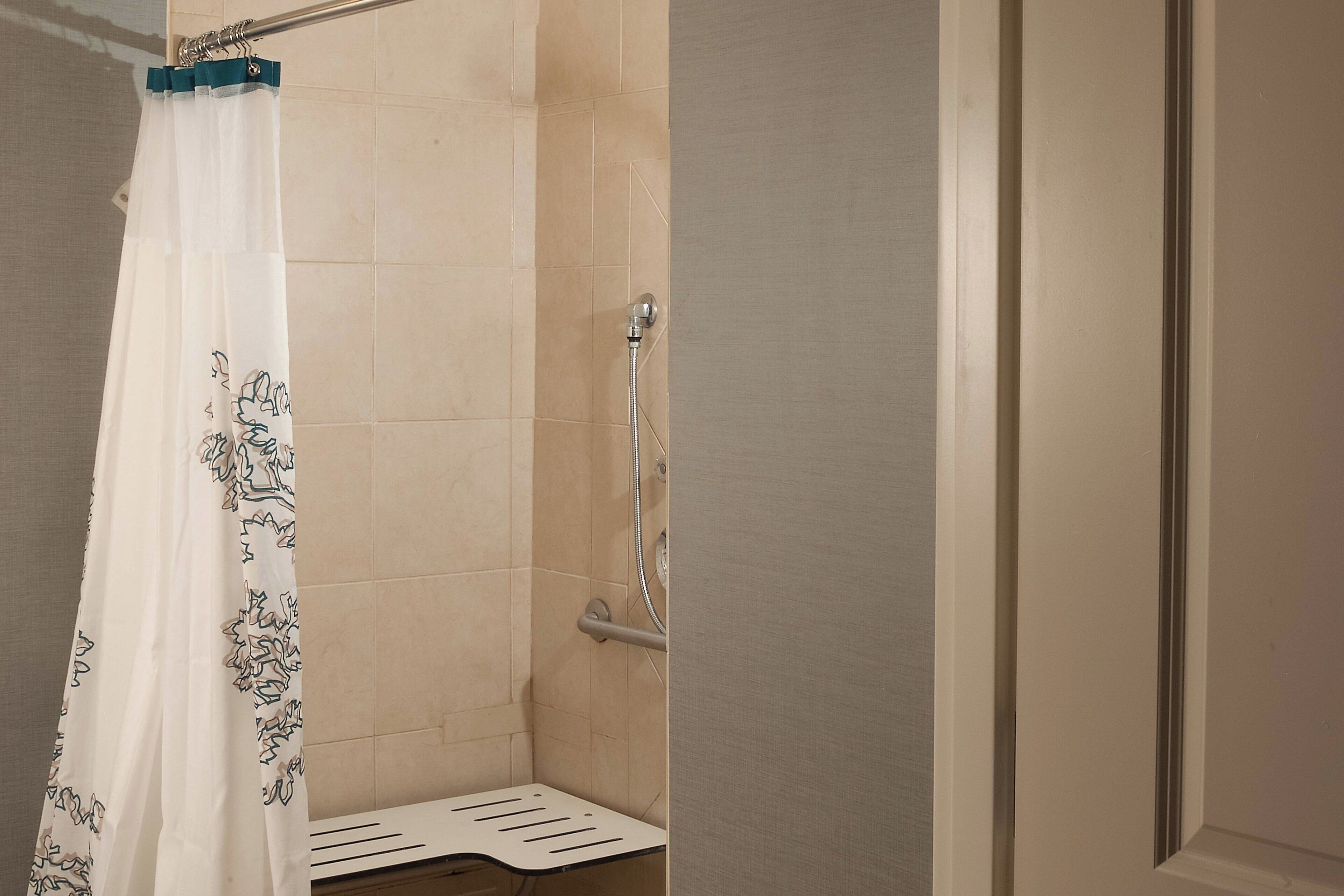 1 bedroom suite, 2 queen, sofa bed | bathroom | combined shower/bathtub, free toiletries, hair dryer, towels