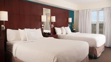 Premium bedding, pillow-top beds, in-room safe, desk