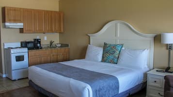 King Bed Studio - Gulf and Pool View (Accessible) | In-room safe, blackout drapes, iron/ironing board, free WiFi