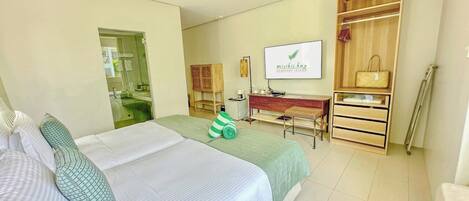 Standard Room, Garden View | Down comforters, minibar, in-room safe, individually decorated