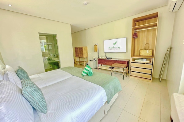 Down comforters, minibar, in-room safe, individually decorated