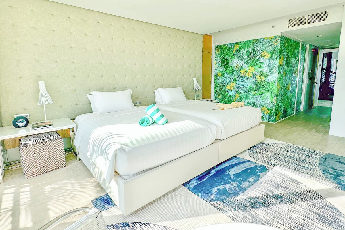 1 dormitorio, edredones de plumas, minibar y caja fuerte