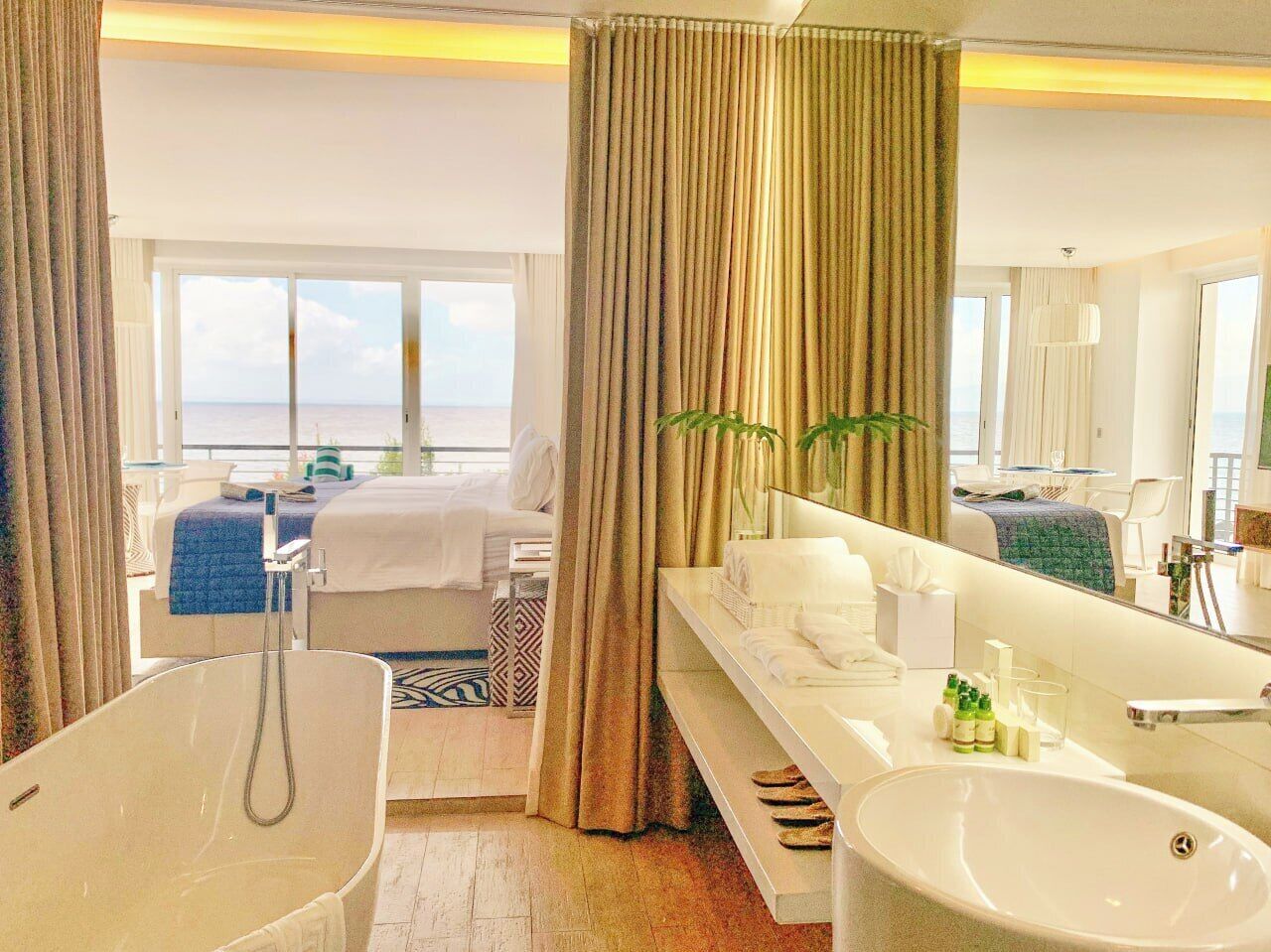 Shower, rainfall showerhead, designer toiletries, bathrobes