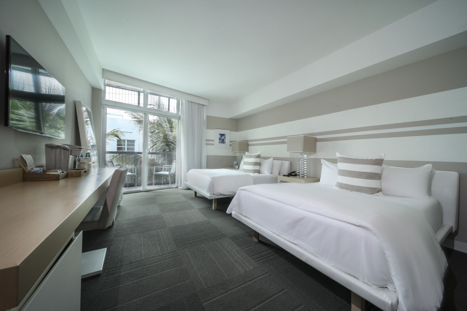 double room, 2 double beds, partial ocean view | 1 bedroom, premium bedding, minibar, in-room safe