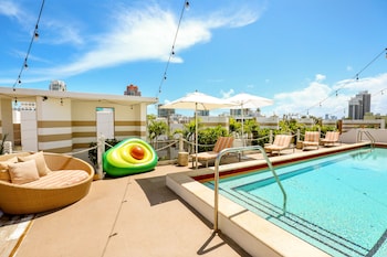 Outdoor pool, sun loungers at The Local House