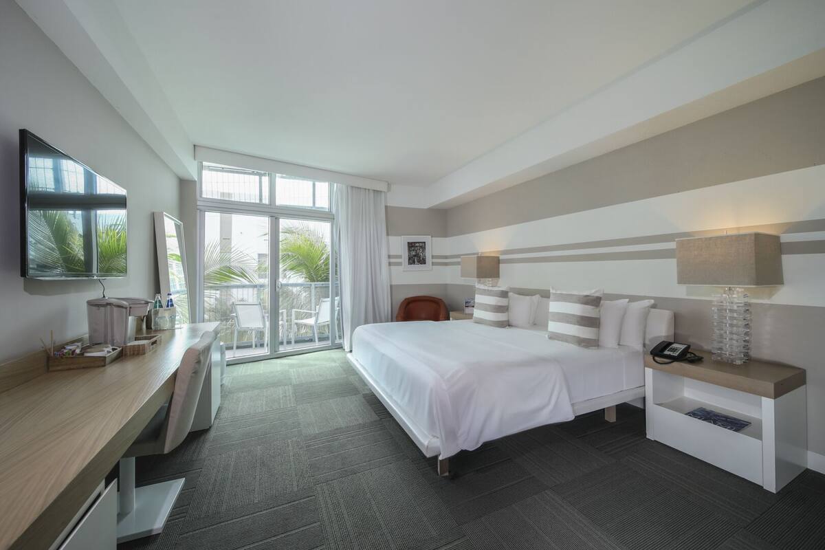 Chambre Deluxe, 1 très grand lit, vue partielle sur l'océan