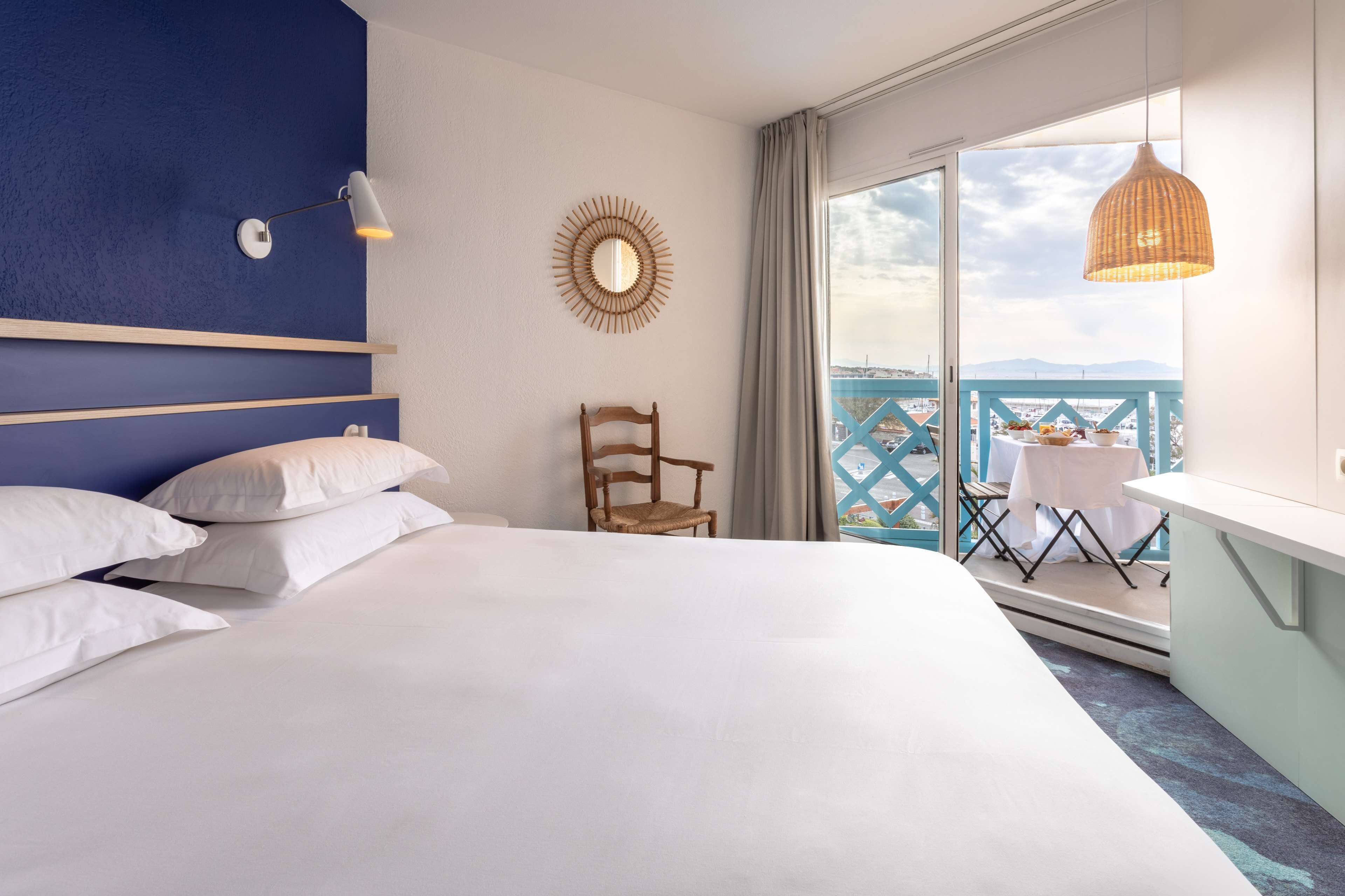 superior room, 1 queen bed, balcony, sea view | minibar, in-room safe, individually decorated, individually furnished