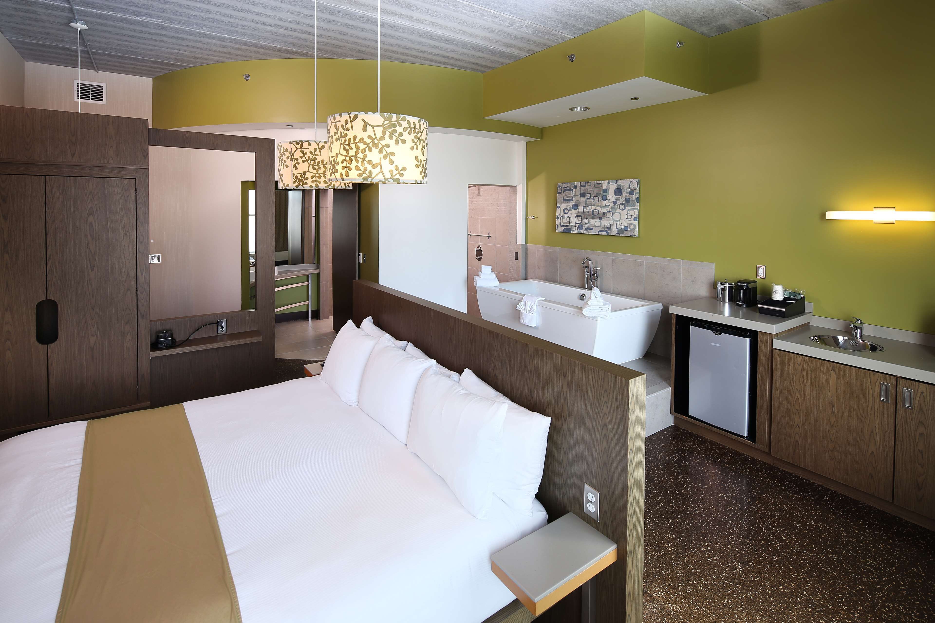 deluxe room, 1 king bed | bathroom | free toiletries, hair dryer, towels, soap