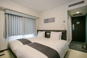 Down comforters, minibar, desk, blackout drapes